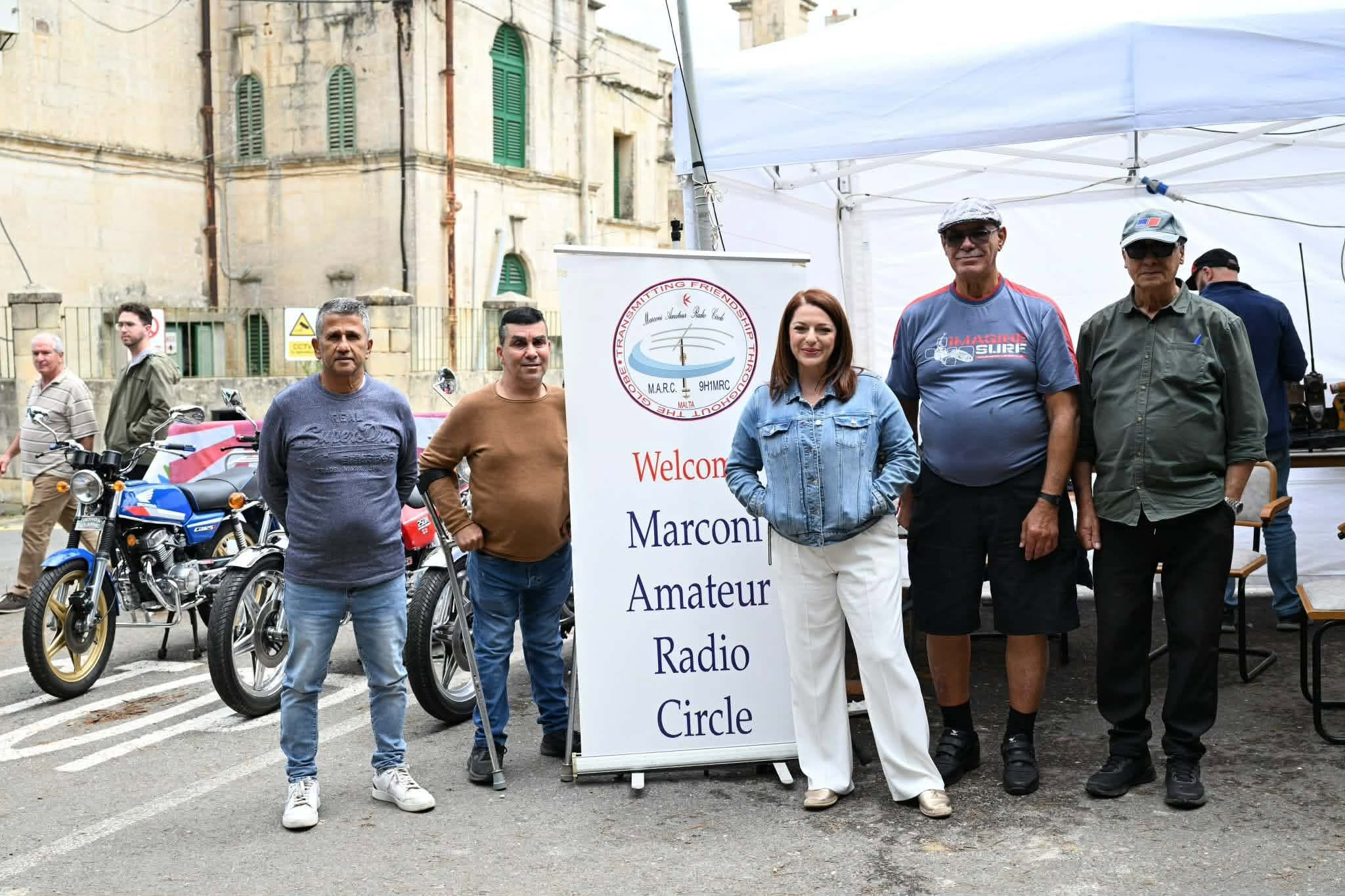 Marconi Amateur Radio Circle members with Minister Julia Farrugia at their stand during Military Imtarfa 2026